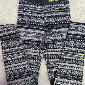 Nike gray, white, and neon yellow pixel like print with slight chafing on back